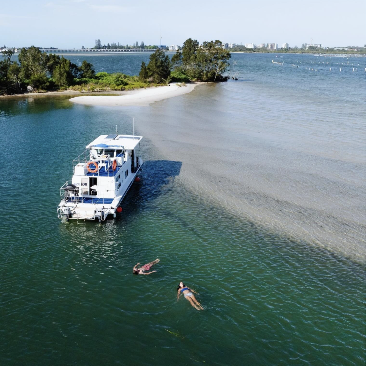 Fishing on the calm protected waters of Wallis Lake